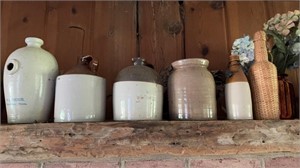 Five stoneware jugs, one crock with a chip on the