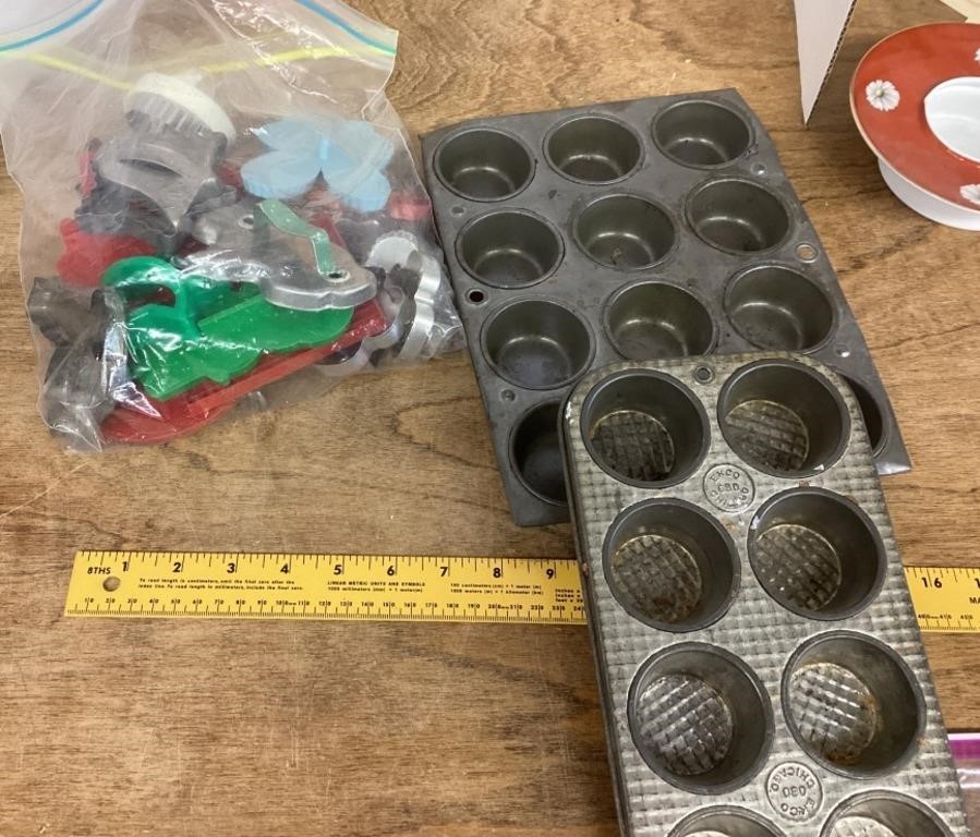 Group of vintage cookie cutters & muffin pans