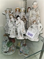 White and gold porcelain figurines made in