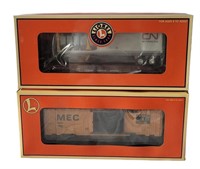 TWO LIONEL TRAIN CARS NEW IN BOX, CN AND MEC
