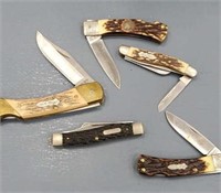 5 pocket knives including Uncle Henry