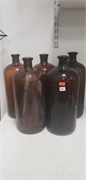 (5) Large Brown Glass Bottles (13.5" Tall)