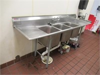 Eagle Group three bay stainless steel sink.