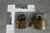 Two (2) small Belknap padlocks