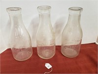 3 EMBOSSED MILK BOTTLES