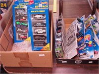 Two boxes of Hot Wheels cars, all in