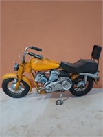 Yellow motorcycle table decor, eight inches by 1