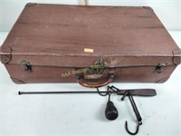 Old plastic luggage trunk and vintage cast iron