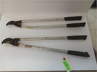 Two pair of snap cut aluminum handled loppers