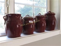 Set Of Maroon Expressions Pottery Canisters