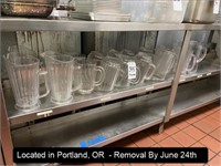 LOT, PLASTIC PITCHERS IN THIS CABINET