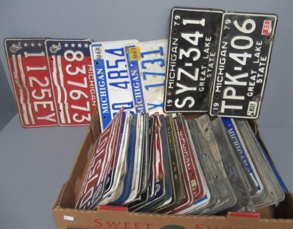 Large lot of vintage license plates includes