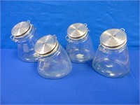 (4) Offset Glass Storage Jars