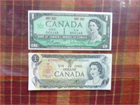 2 billets de 1$ : 1 x centenaire 
de la