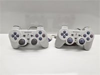 PAIR OF PLAYSTATION PS ONE SLIM CONTROLERS