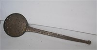 hand wrought copper skimmer with decoration