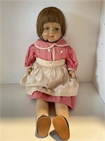 Antique composite doll with red dress