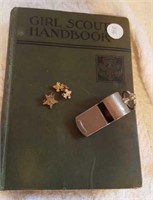 Girl Scout Handbook, scouting whistle and pins,