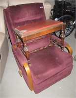 Vintage upholstered rocker recliner with wood