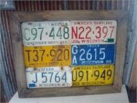 Six Framed License Plates C97