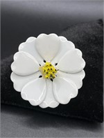 White enamel flower brooch with yellow center