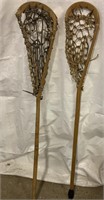 2- lacrosse sticks