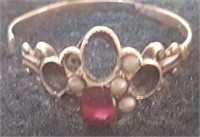 Gold Ring with red set, broken band