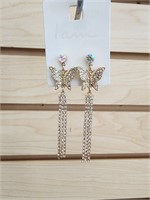 Gold tone crystal butterfly dangle earrings