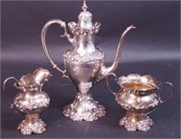 An after-dinner sterling silver coffee pot and