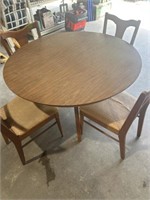Kitchen table with four chairs and two leafs
45”