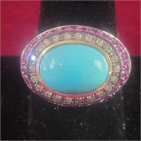 14K Ring with Turquoise Center Stone surronded b