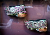 Pair framed Qing dynasty bound feet shoes