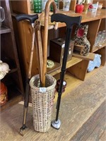 Wicker umbrella stand with five canes