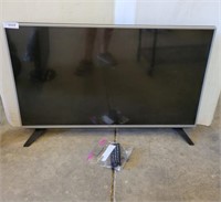 LG 43IN TV ON STAND W/ REMOTE