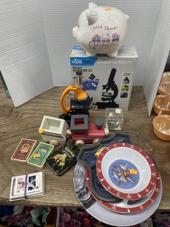 Microscope kit, sports cards, vintage Pokémon tin