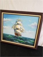Framed canvas picture of a boat on the ocean 25 x