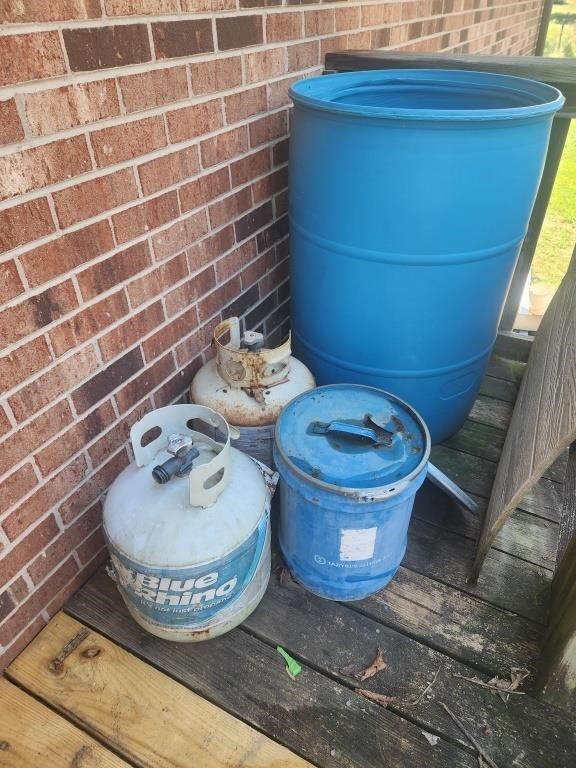 Propane tanks. Large Plastic barrel, metal can