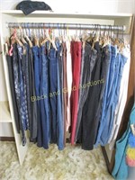 Rack Of Women's Slacks And Jeans