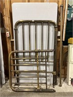 Brass bed with rails