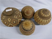 Four lidded African gathering baskets