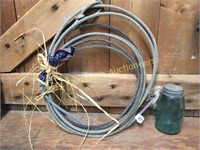 Old cowboys lasso rope