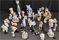 Collection of cat figurines, salt shakers in a box