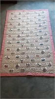 PINK EDGED HANDMADE QUILT WITH ANIMALS