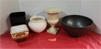Assorted ceramic flower pots.