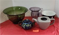 Glass fruit bowls, tea pots and vase.