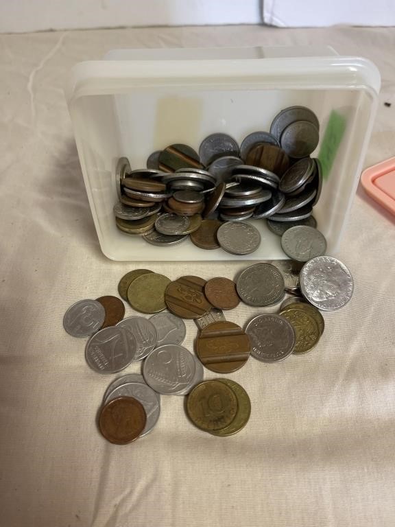 Container of assorted coins- see pictures