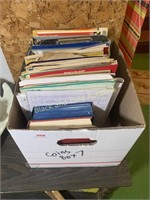 Box of assorted sheet music and music books