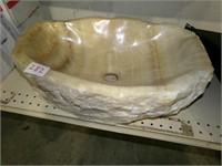 Vessel stone sink
