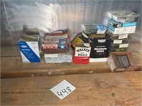 Various boxes of nails, etc