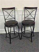 (2) Metal padded seat swiveling bar stools 38”